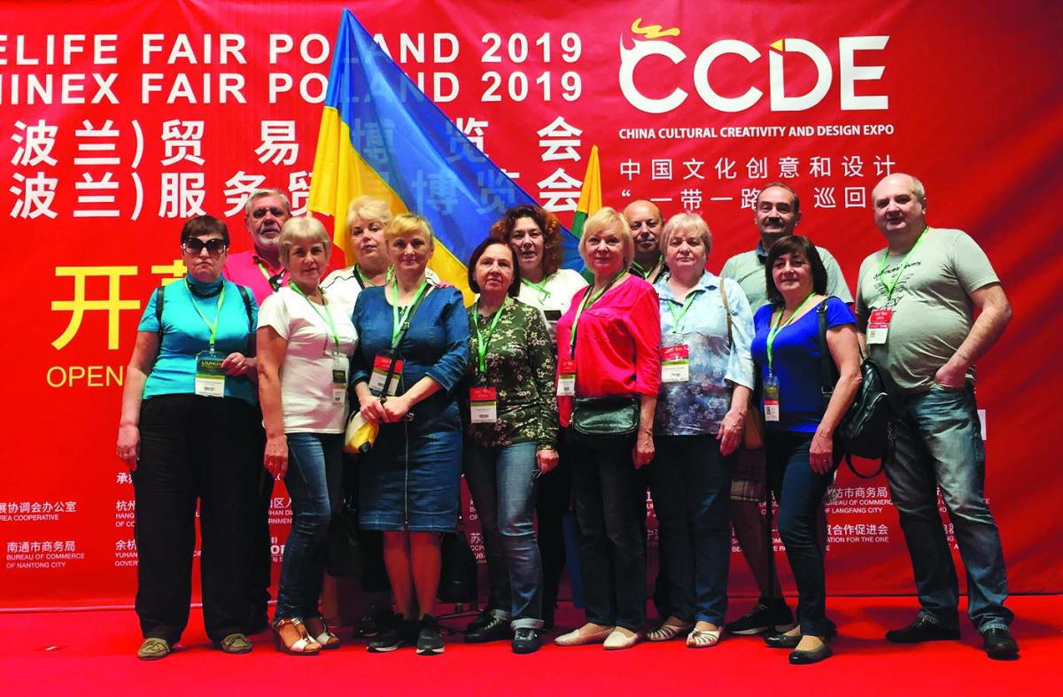 Українські туристи на китайській виставці.