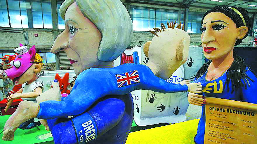 Сатира на “Брексіт”: британська прем'єр Тереза Мей без жалю відриває дитину, що чіпляється за груди Євросоюзу