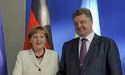 Порошенко розповів Меркель про порушення перемир’я на сході України